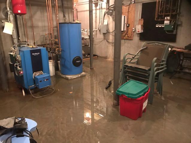  A flooded basement before water damage restoration services in Tacoma, Washington