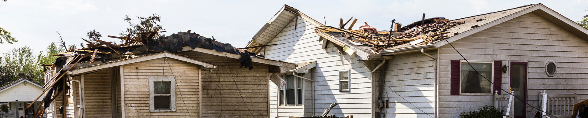 The exterior of two tornado and storm damaged homes in Burns Harbor, Indiana