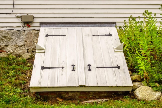 door to tornado shelter in basement of home