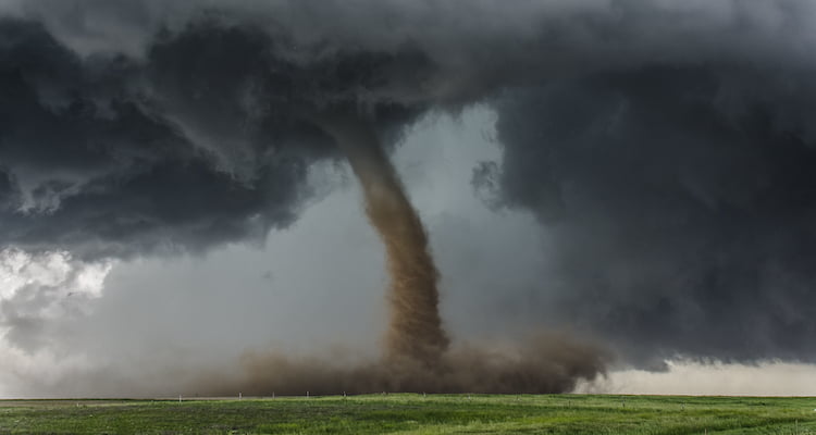 cloud of debris as tornado approaches