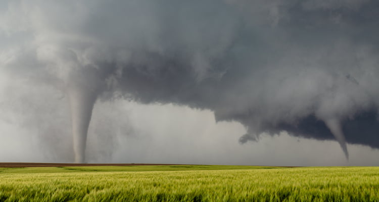 funnel shaped clouds forming in field