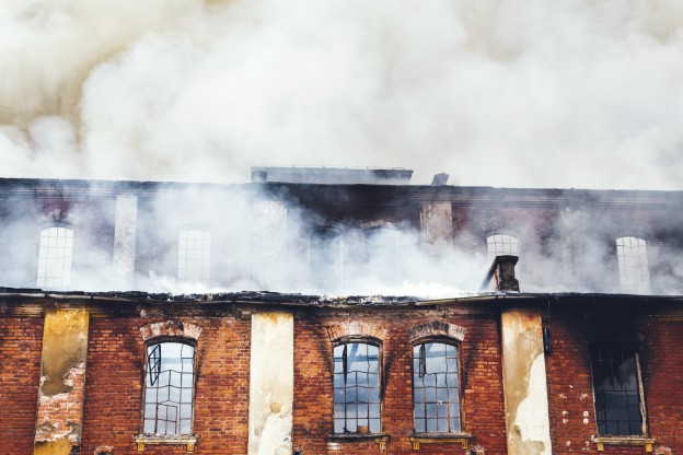 smoke coming out of a building during a fire