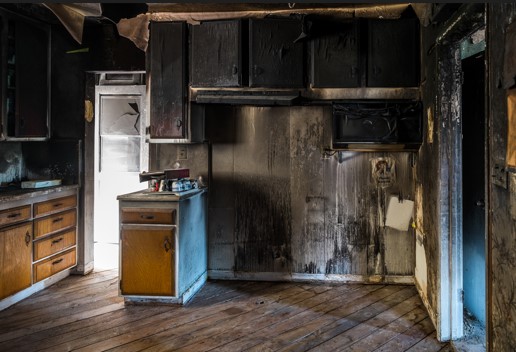 A fire damaged kitchen in a home in Clifton Heights, Pennsylvania, before fire damage restoration services