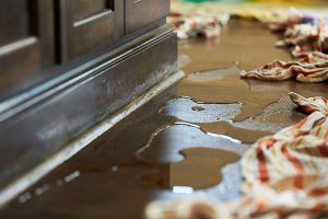 A water damaged floor in St. Peters before ServiceMaster’s water damage restorations services 