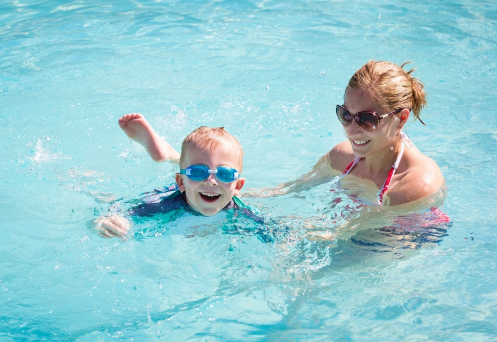 Woman and child in a pool