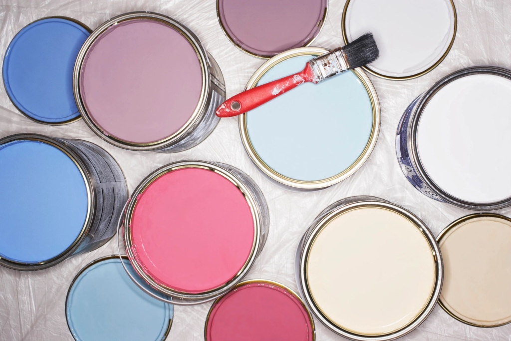 Paint cans with different colors of paint