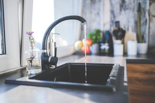 Turned on water faucet