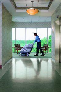 Man cleaning an office building