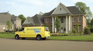 Servicemaster truck outside a home