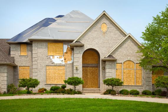 boarded up house