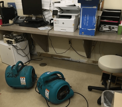 Drying machines underneath a desk