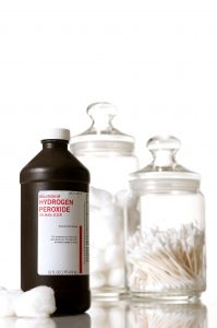 hydrogen peroxide bottle with q tips