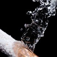 frozen burst pipe releasing water