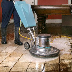 Machine Cleaning Floors After Fire