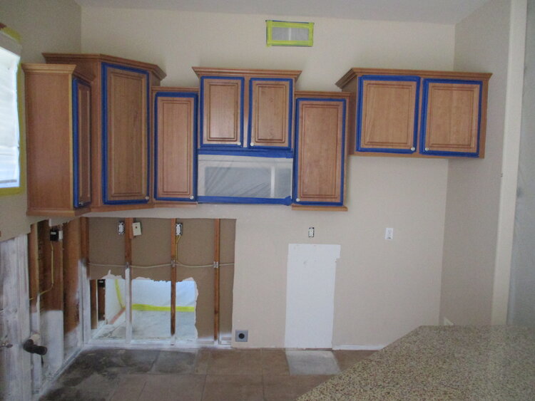 Cabinets over an opened wall