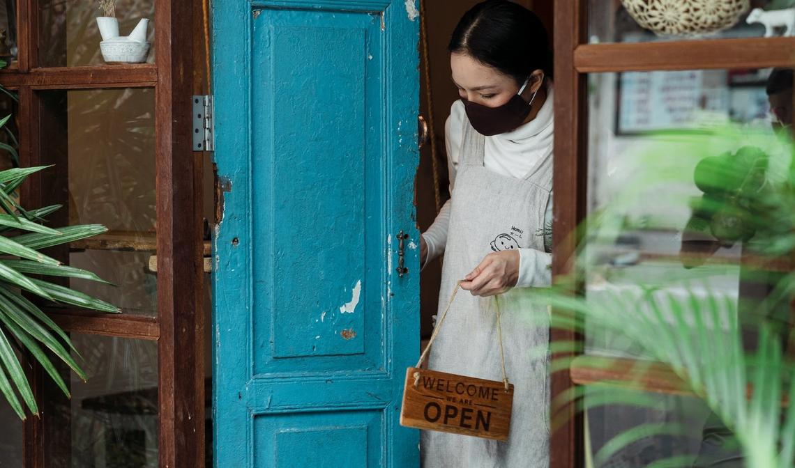 Business Owner Opening Door