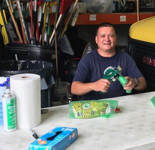 man sitting down and smiling