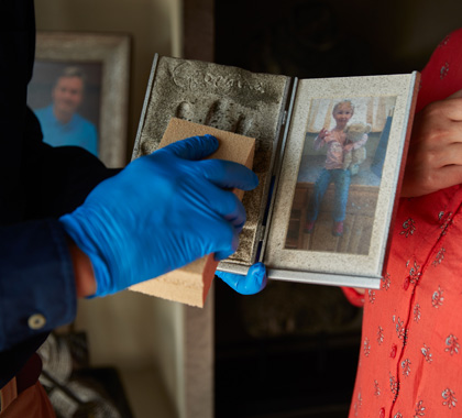 ServiceMaster Employee Cleaning Photo After Fire Damage