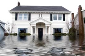 Flooded home before receiving storm damage repair from ServiceMaster