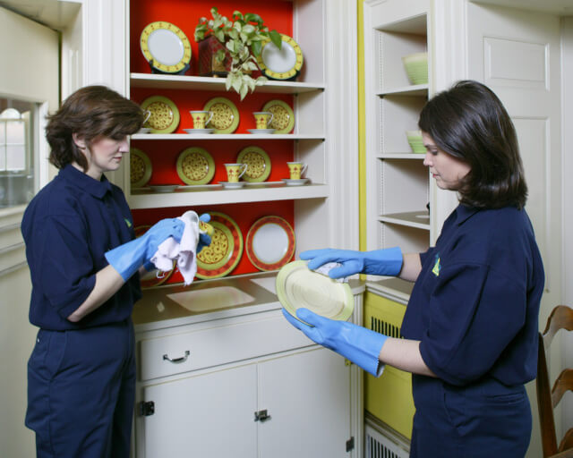 Two Female Techs Cleaning