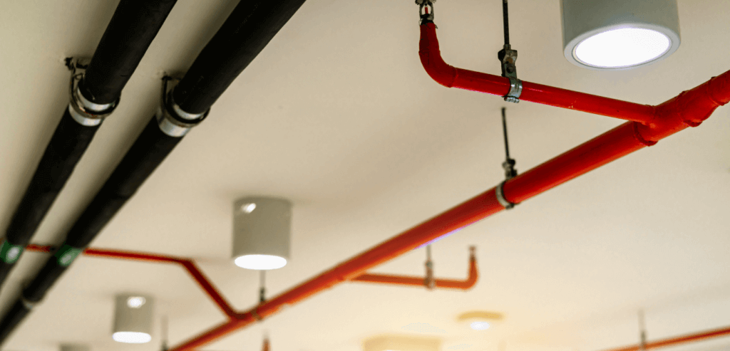 commercial fire sprinklers in a building ceiling
